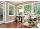 Bright living room offering multiple windows with natural light and exterior views at 2080 Old Dominion Rd, Atlanta, GA 30350
