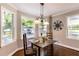 Cozy breakfast nook with a dining table, lots of natural light, and beautiful views at 253 Pine Valley Dr, Powder Springs, GA 30127