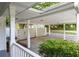 Covered carport with convenient access to the home and additional parking space for multiple vehicles or outdoor equipment at 253 Pine Valley Dr, Powder Springs, GA 30127