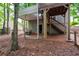 View of the home's backyard with a deck and stairs leading to the backyard at 3573 Bramwell Nw Xing, Kennesaw, GA 30144