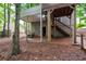 View of backyard features a porch with steps to a wooden deck at 3573 Bramwell Nw Xing, Kennesaw, GA 30144