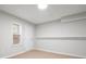 Unfinished basement with a window and a door at 3573 Bramwell Nw Xing, Kennesaw, GA 30144