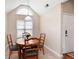 Cozy breakfast nook with natural light and a round wooden table at 3573 Bramwell Nw Xing, Kennesaw, GA 30144