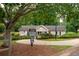 Exterior shot of a clubhouse, featuring a welcoming entrance and well-maintained landscaping at 3573 Bramwell Nw Xing, Kennesaw, GA 30144