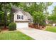 Charming two-story home with landscaped yard, an attached garage, and beautiful stone accents at 3573 Bramwell Nw Xing, Kennesaw, GA 30144