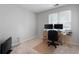 Cozy, carpeted room with neutral walls and a large window, offering a blank slate for personalization at 3573 Bramwell Nw Xing, Kennesaw, GA 30144