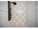 Modern shower system with unique tilework and multi-jet shower panel at 3904 Bakers Ferry Sw Rd, Atlanta, GA 30331