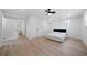Spacious bedroom featuring a ceiling fan, white walls and an ensuite bathroom at 3904 Bakers Ferry Sw Rd, Atlanta, GA 30331