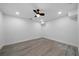 Bright bedroom with modern ceiling fan, recessed lighting, and stylish flooring at 3904 Bakers Ferry Sw Rd, Atlanta, GA 30331