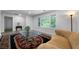 Bright living room boasts a large window, an area rug, and recessed lighting at 3904 Bakers Ferry Sw Rd, Atlanta, GA 30331
