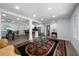 Open floor plan featuring a living room, dining area, and kitchen with an island at 3904 Bakers Ferry Sw Rd, Atlanta, GA 30331
