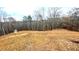 Large backyard with storage shed and mature trees, great for outdoor activities at 7460 Highway 101 N, Rockmart, GA 30153