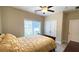 Bright bedroom features a window, neutral walls, and a double closet for ample storage at 7460 Highway 101 N, Rockmart, GA 30153
