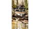 Creek cascading down a rocky bank with water flowing over stones creates a scenic view at 7460 Highway 101 N, Rockmart, GA 30153