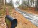 Mailbox at the bottom of a long driveway, offering privacy and a sense of seclusion at 7460 Highway 101 N, Rockmart, GA 30153