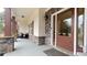 Charming front porch with stone accents and rocking chairs at 7460 Highway 101 N, Rockmart, GA 30153
