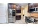 The kitchen has stainless steel appliances and a dedicated wine rack, perfect for hosting and everyday living at 7460 Highway 101 N, Rockmart, GA 30153