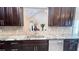 Kitchen featuring granite countertops, stainless steel appliances, and decorative tile backsplash at 7460 Highway 101 N, Rockmart, GA 30153