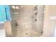 Bathroom featuring a spacious glass shower, gray tile walls, and a tiled shower floor at 7460 Highway 101 N, Rockmart, GA 30153