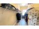 Organized walk-in closet featuring metal shelving, multiple hanging rods, and wood look floors at 7460 Highway 101 N, Rockmart, GA 30153