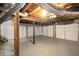 Unfinished basement showing the open space, ductwork, stairs and walls with metal support beam at 1202 Laurel Cliff Se Dr, Smyrna, GA 30082