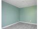 Clean and simple room with tile floors, light green walls, and a neutral palette at 1202 Laurel Cliff Se Dr, Smyrna, GA 30082
