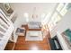 Stylish living room with hardwood floors, high ceilings and modern chandelier that provides great natural light at 1202 Laurel Cliff Se Dr, Smyrna, GA 30082
