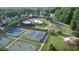 An aerial view features the community amenities including tennis courts, pool, and playground at 3530 Ridge Hill Pkwy, Douglasville, GA 30135