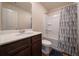 Bathroom boasts tile floors, a modern vanity, an elongated toilet, and a shower/tub combination at 3530 Ridge Hill Pkwy, Douglasville, GA 30135