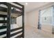 Bedroom featuring a bunk bed, carpeted floor, and a window with blind allowing for natural light at 3530 Ridge Hill Pkwy, Douglasville, GA 30135