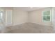 Neutral bedroom features carpet, a window with blinds, and an ensuite bathroom, offering a blank canvas at 3530 Ridge Hill Pkwy, Douglasville, GA 30135