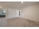 Upstairs bonus room with carpet, closet, and natural light, offering flexible living space at 3530 Ridge Hill Pkwy, Douglasville, GA 30135