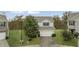 Two-story home features a two-car garage and a manicured front lawn at 3530 Ridge Hill Pkwy, Douglasville, GA 30135