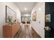 Bright hallway features modern decor, laminate flooring, and a digital door lock at 3530 Ridge Hill Pkwy, Douglasville, GA 30135