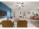 Cozy living room with stylish furnishings, a modern ceiling fan and natural light at 3530 Ridge Hill Pkwy, Douglasville, GA 30135