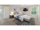 Comfortable main bedroom with natural lighting, carpeting, and a small sitting bench at 3530 Ridge Hill Pkwy, Douglasville, GA 30135