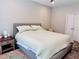 Comfortable bedroom with neutral tones, carpet, and a cozy gray bed frame at 5641 Roswell Rd # 111, Sandy Springs, GA 30342