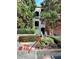 Residential building exterior with manicured landscaping and walkway at 5641 Roswell Rd # 111, Sandy Springs, GA 30342