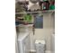 Well-organized pantry space with shelving and included washer and dryer at 5641 Roswell Rd # 111, Sandy Springs, GA 30342