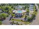 A landscape view of the neighborhood pool, pond, tennis courts and clubhouse at 3525 Elder Field Ln, Cumming, GA 30040