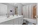 Bathroom features a double vanity and a shower-tub combo at 3525 Elder Field Ln, Cumming, GA 30040