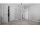 Bedroom features neutral walls, gray carpet and walk-in closet at 3525 Elder Field Ln, Cumming, GA 30040