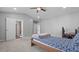 Neutral bedroom with a vaulted ceiling and carpet, offering a serene retreat at 3525 Elder Field Ln, Cumming, GA 30040