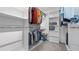Walk-in closet with custom shelving and ample storage space for organization at 3525 Elder Field Ln, Cumming, GA 30040
