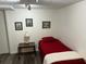 Cozy bedroom with twin bed, side table, and wall decor at 402 Hancock Ct, Woodstock, GA 30188