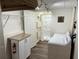 Finished laundry area with cabinet, shower, and newer washer and dryer at 402 Hancock Ct, Woodstock, GA 30188