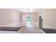 Bright open living and kitchen area with stainless steel appliances at 4171 Whispering Forest Sw Ct, Lilburn, GA 30047