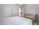 Bright bedroom with a light color palette and a comfortable layout including a crib, perfect for a Gathering at 5370 Newport Bay Psge, Alpharetta, GA 30005