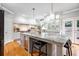 Gourmet kitchen with marble island, stainless steel appliances, and custom cabinetry at 5370 Newport Bay Psge, Alpharetta, GA 30005