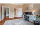 Inviting home office with hardwood floors, neutral paint, and abundant natural light, perfect for working from home at 5370 Newport Bay Psge, Alpharetta, GA 30005